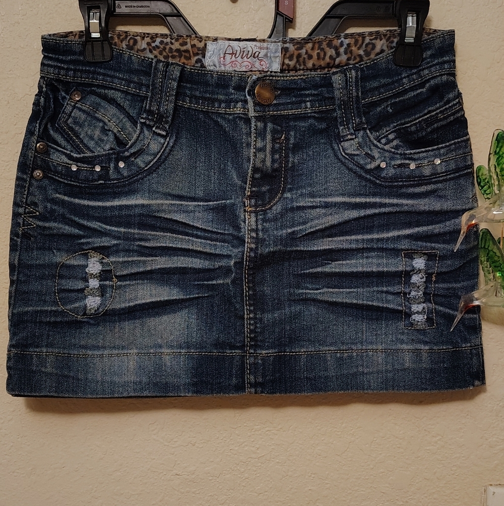 AVIVA Blue Denim Mini Skirt with Distressed Accents